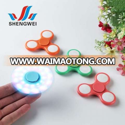 2017 popular toy ABS triangle finger spinner bearing hand spinner with led